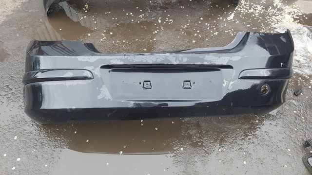 Задний бампер Opel Astra H
