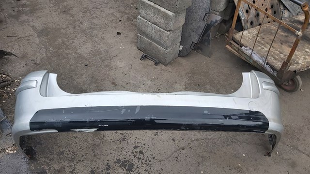 Бампер задний 24460461 GM