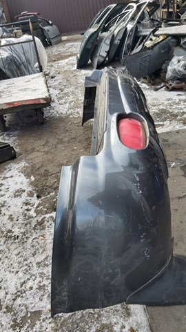 Бампер задний 8661026900 HYUNDAI