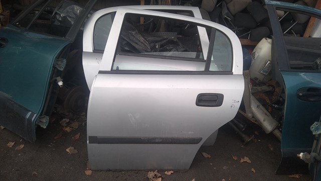 Двери Opel Astra
