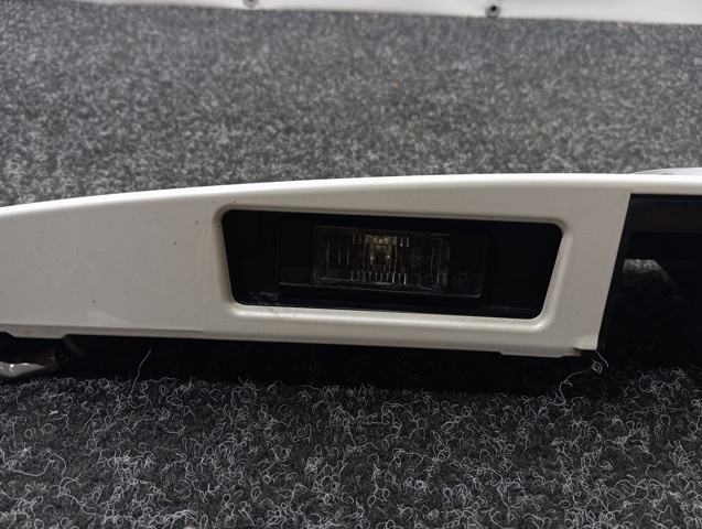 Фонарь освещения номерного знака 265103BB0A NISSAN