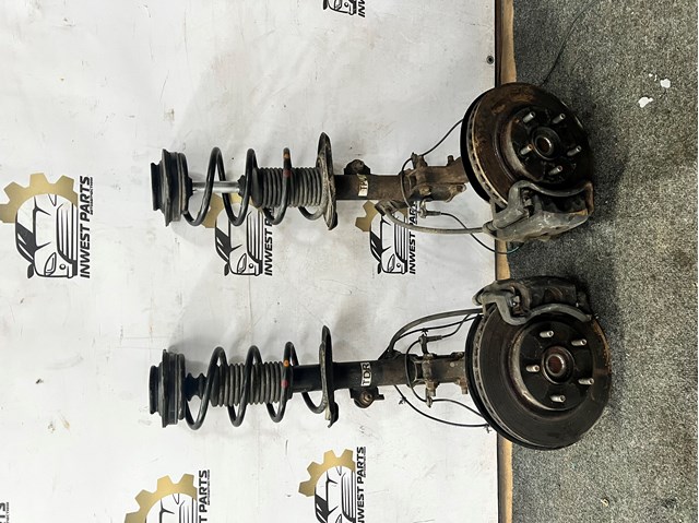 NISSAN E43031KC2A Амортизатор передний левый в наличии Украина