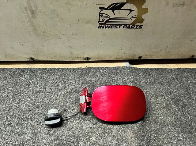 Лючок (дверца) бензобака KB7W42410 MAZDA