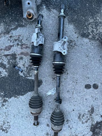 Левая полуось GD002560X MAZDA