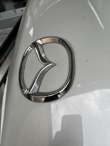 Эмблема на крышку багажника GS1D51730 MAZDA