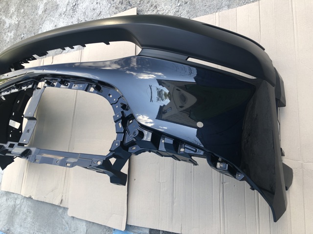 Передний бампер DFR550031 MAZDA