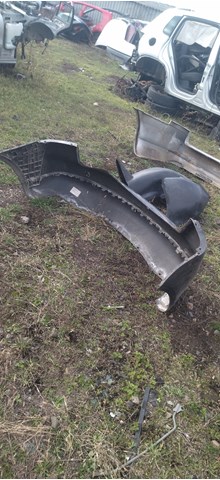 Задний бампер 1T0807417 VAG