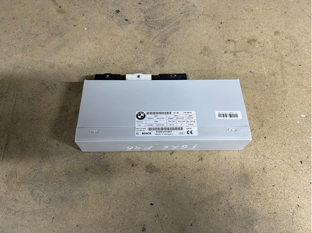 Блок управления открытия крышки багажника 61357412610 BMW