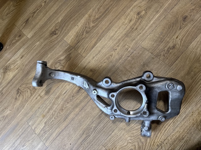 Цапфа передняя левая 80A407559 VAG