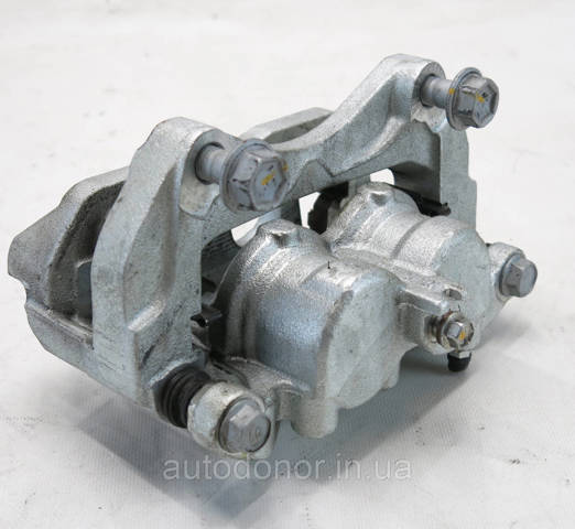 NISSAN 410115MT0A Суппорт тормозной передний левый в наличии Черновцы