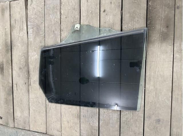Стекло двери задней левой BP4K73511A MAZDA