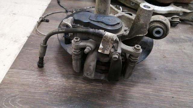 Суппорт тормозной левый задний 13514388 GM