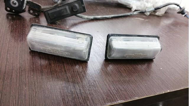Фонарь освещения номера 265109Y00A NISSAN