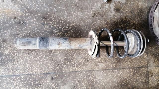 Стойка передняя левая 31316768923 BMW