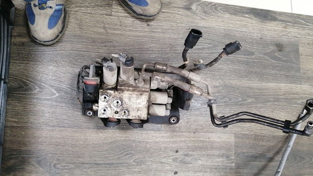 Блок клапанов гидравлической подвески AБС (ABS) 37206781488 BMW