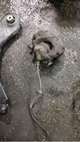Суппорт тормозной передний правый 410018218R NISSAN