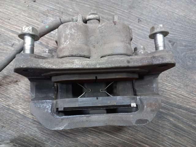 41011W000P MITSUBISHI Суппорт тормозной передний левый купить в Павлоград