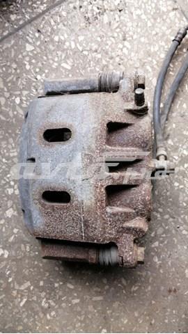 Суппорт тормозной, передний, левый 41011ZC60A NISSAN