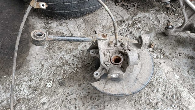 Пыльник тормозного диска заднего левый 44030EG010 NISSAN