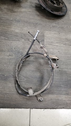 Трос ручного тормоза задний 47560SWA013 HONDA