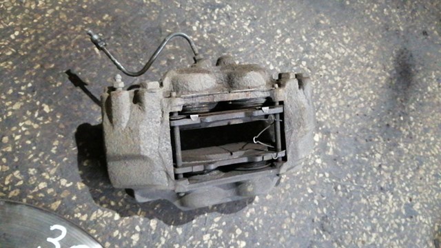 Суппорт тормозной, передний, левый 4775060300 TOYOTA