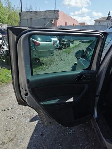 Стекло двери задней левой 5L0845205B VAG