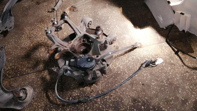 Пыльник тормозного диска заднего правый KD4526261 MAZDA
