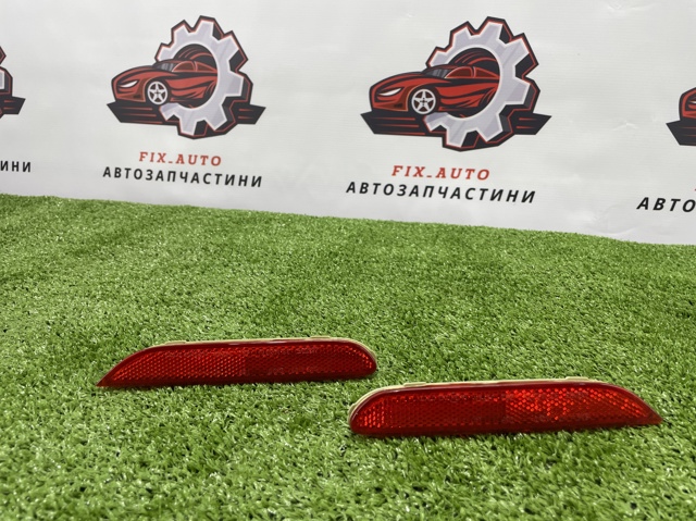 Левый катафот заднего бампера 26565JJ90A NISSAN