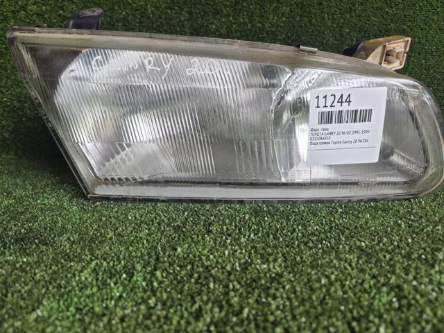 Вставка фары правой 81110AA010 TOYOTA