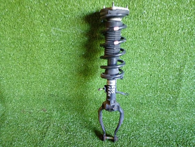 Амортизатор передней подвески правый E6110JK50D NISSAN