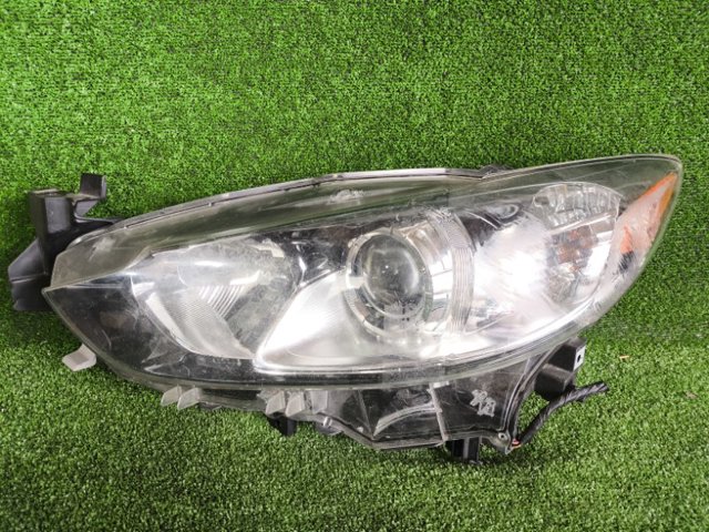 Вставка фары левой GMP2510L0 MAZDA