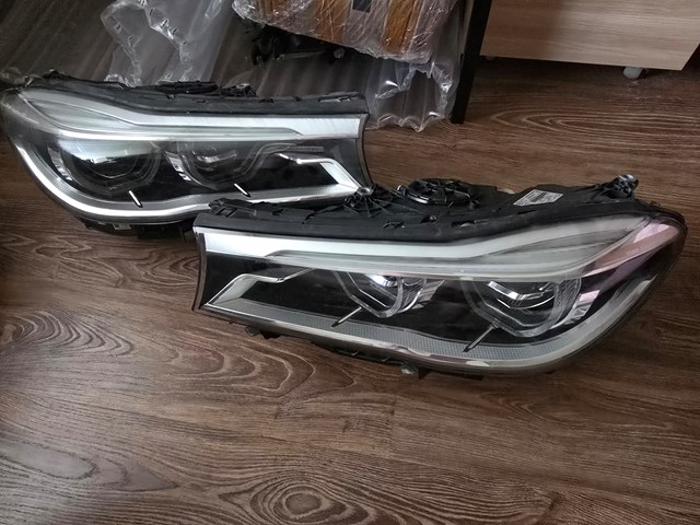 Вставка фары левой 63117408709 BMW