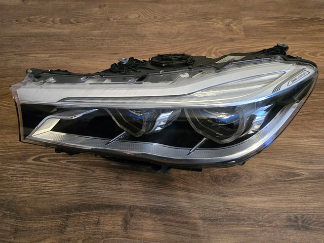 BMW 7408703 Левая фара в наличии Павлоград
