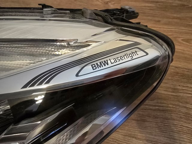 Фара основная левая 7408703 BMW