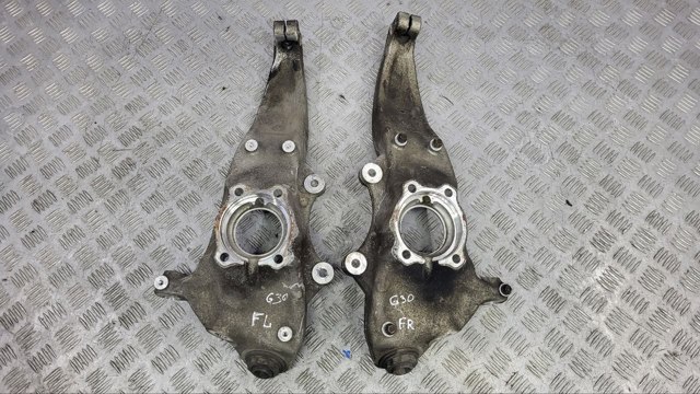 Цапфа - поворотный кулак передний, левый 31206884385 BMW