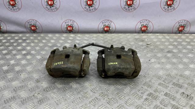 Суппорт тормозной, передний, правый 41001JN00A NISSAN