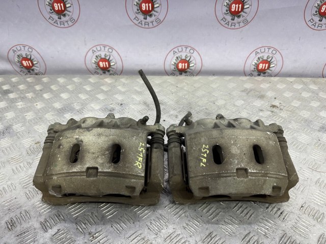 Суппорт тормозной передний левый 41011ZC60A NISSAN
