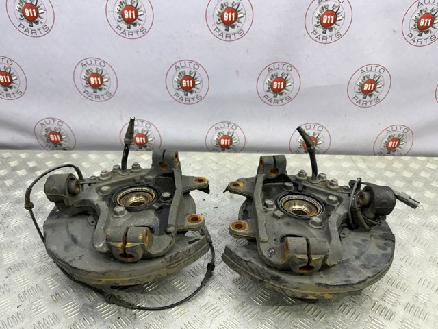 Цапфа (поворотный кулак) задний левый 430191LA0A NISSAN