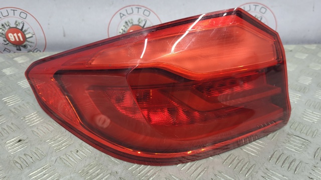 Задний левый внешний фонарь 63217376469 BMW