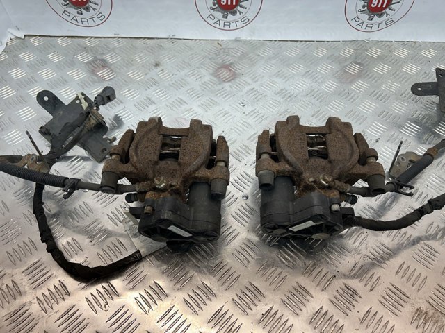 Тормозной суппорт задний левый DG9Z2553C FORD