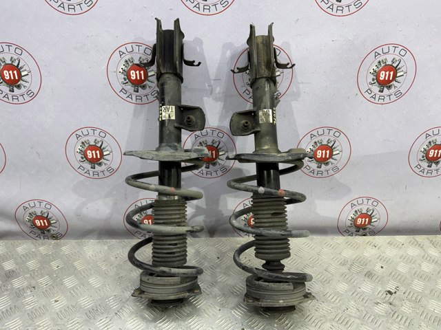 Амортизатор передней подвески правый E43021KC2A NISSAN