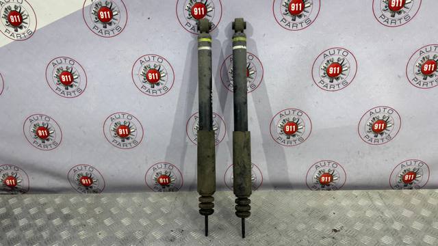 Амортизационная стойка задняя E62101KC3A NISSAN