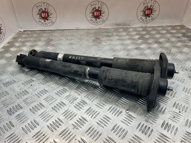 Амортизационная стойка задняя E62105WB1A NISSAN