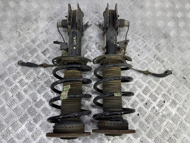 Амортизатор передней подвески левой EG9Z18124K FORD