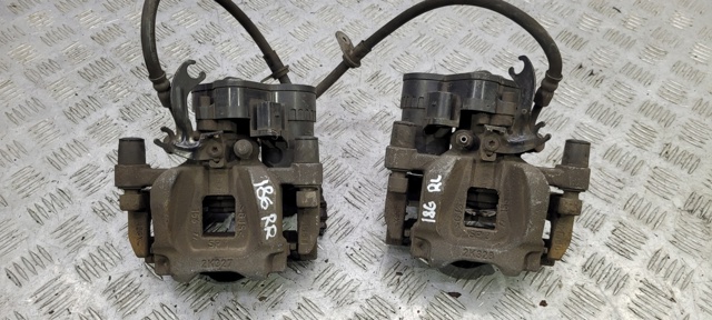 Суппорт тормозной задний правый LR061380 LAND ROVER