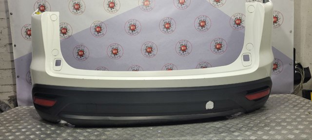 Бампер задний TK4850221CBB MAZDA