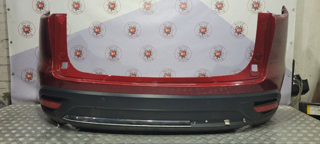 Бампер задний TK5150221DBB MAZDA