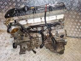 Двигатель голый 11001438681 BMW