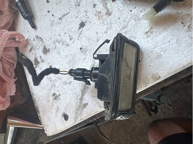 Фонарь освещения номера Fiat Doblo 1