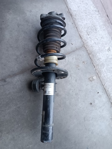 Амортизатор подвески передний левый 31316871779 BMW